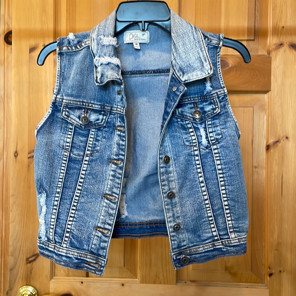 Distressed denim vest